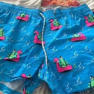 Bright Blue Flamingo Pool Float Swim Trunks